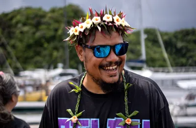 Palauan man with flowers around his head